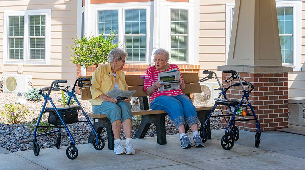 Cornerstone Senior Living Property - Seniors sitting on the Patio